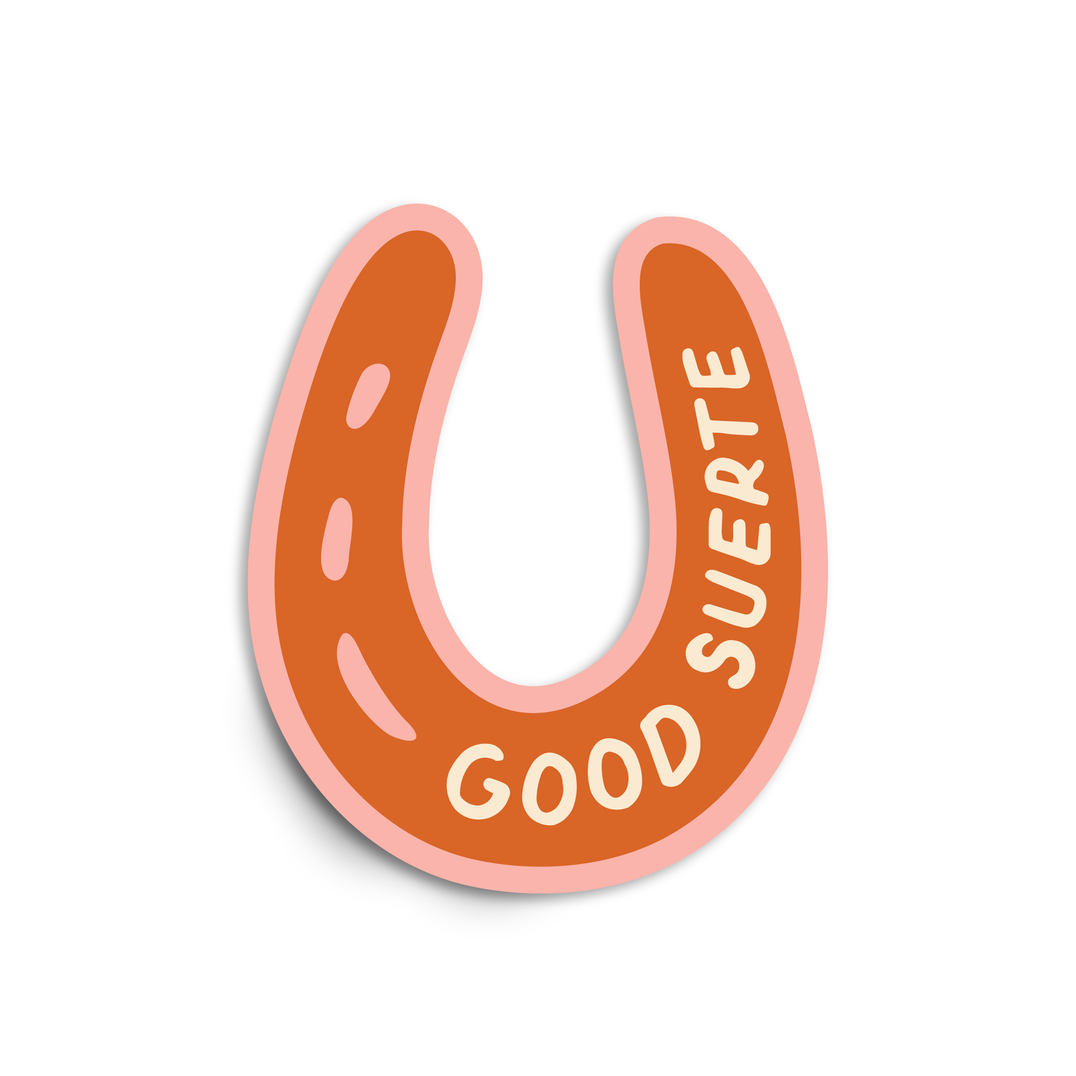 An orange horseshoe-shaped sticker with the text 'GOOD SUERTE' on it.