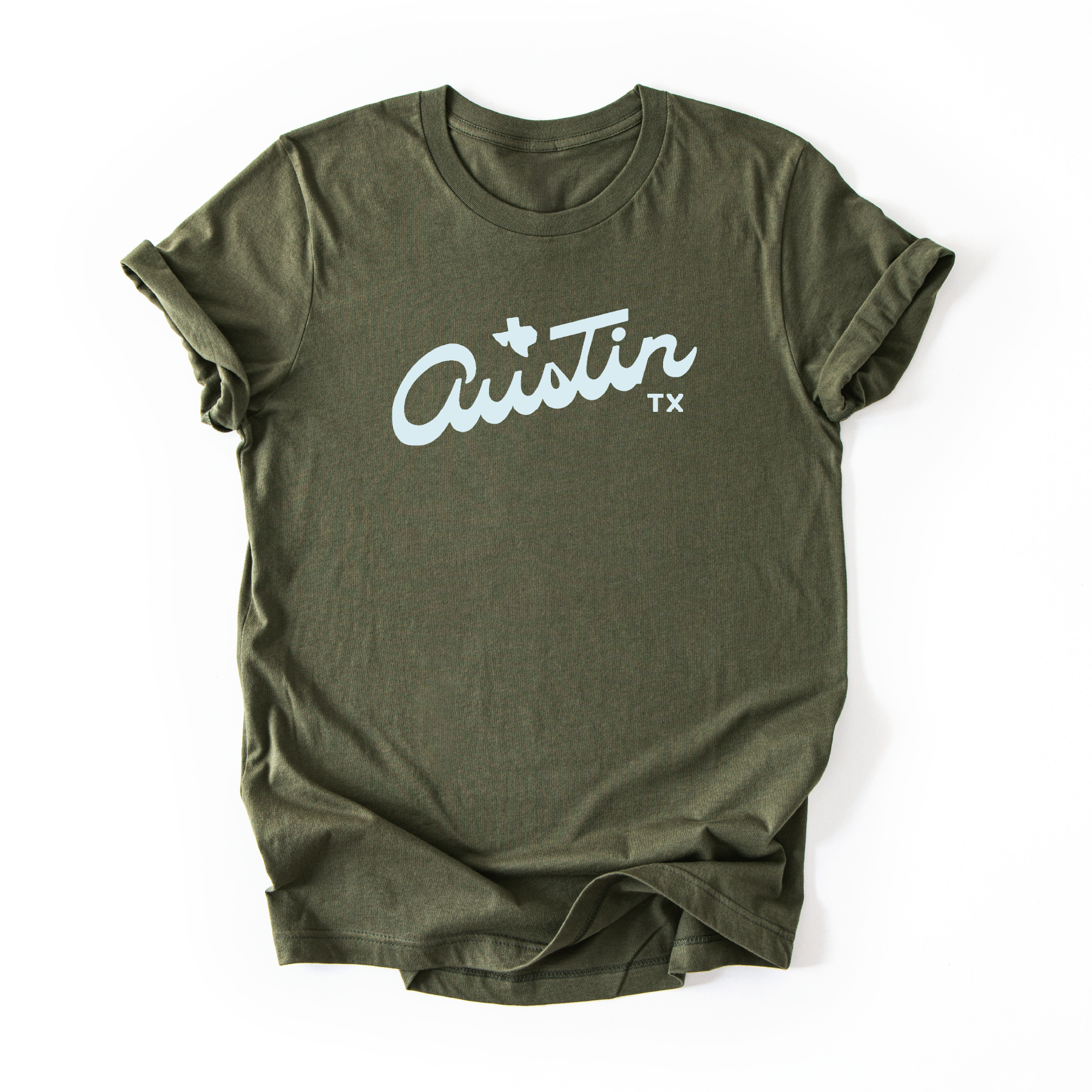 An army green tshirt with 'Austin TX' printed on it in white.