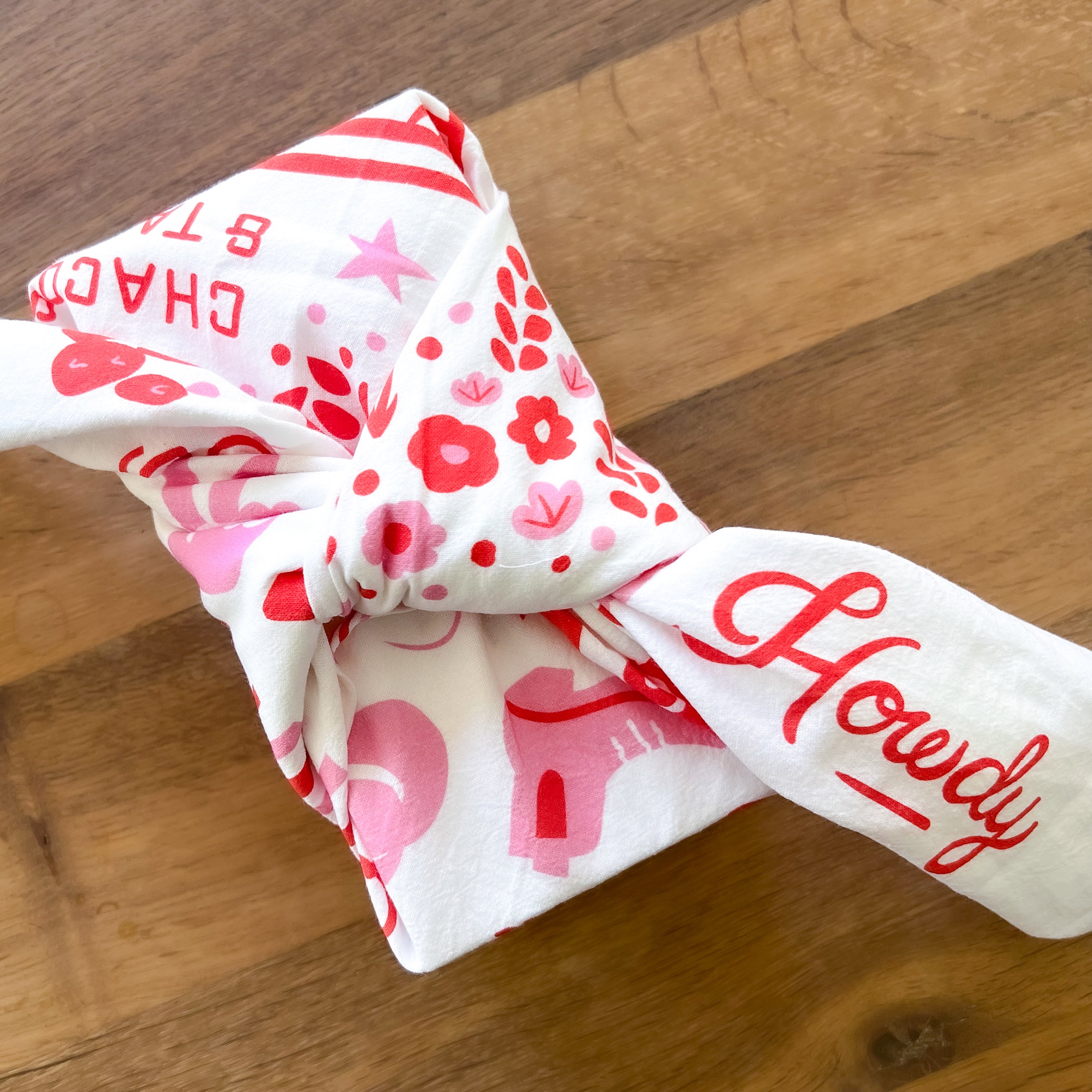 This Austin tea towel is covered in bright, bold, Austin icons. It's a white flour sack tea towel with red and pink art, all created by Austin Illustrator, Annie Mayfield. Makes a great, uniquely Austin gift or souvenir!