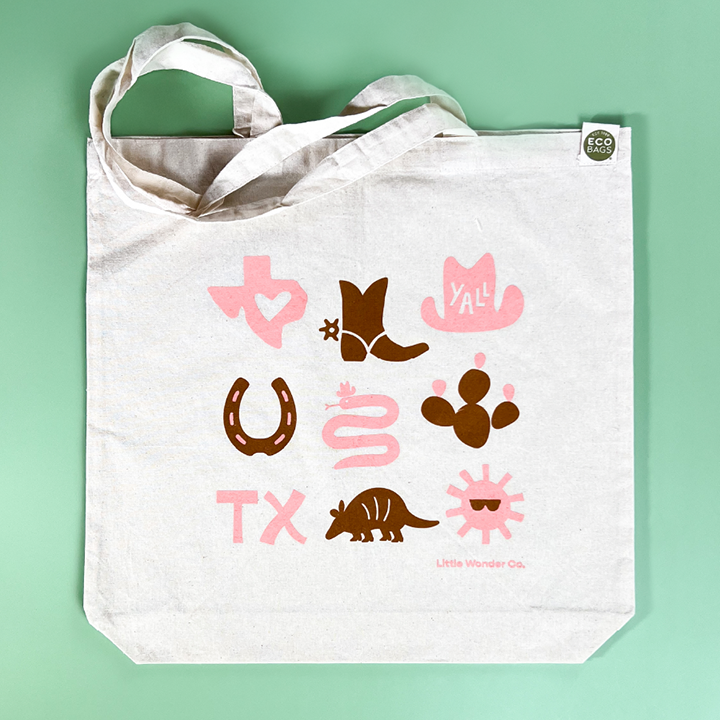 This Texas tote bag is super cute, and includes hand-drawn icons that represent Texas. It's perfect for gifting and souvenirs.