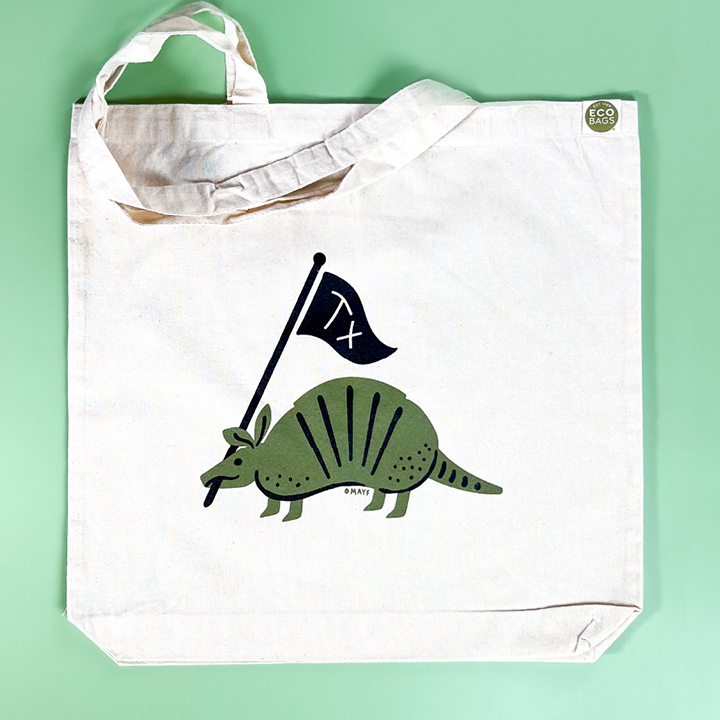 This armadillo tote bag is full of Texas pride! This little guy is the Official Texas State (Small) Mammal and can be seen running or rolling around Texas! Hope to see you running and rolling around Texas with this tote in hand too! This Texas armadillo tote is perfect for gifting and souvenirs.