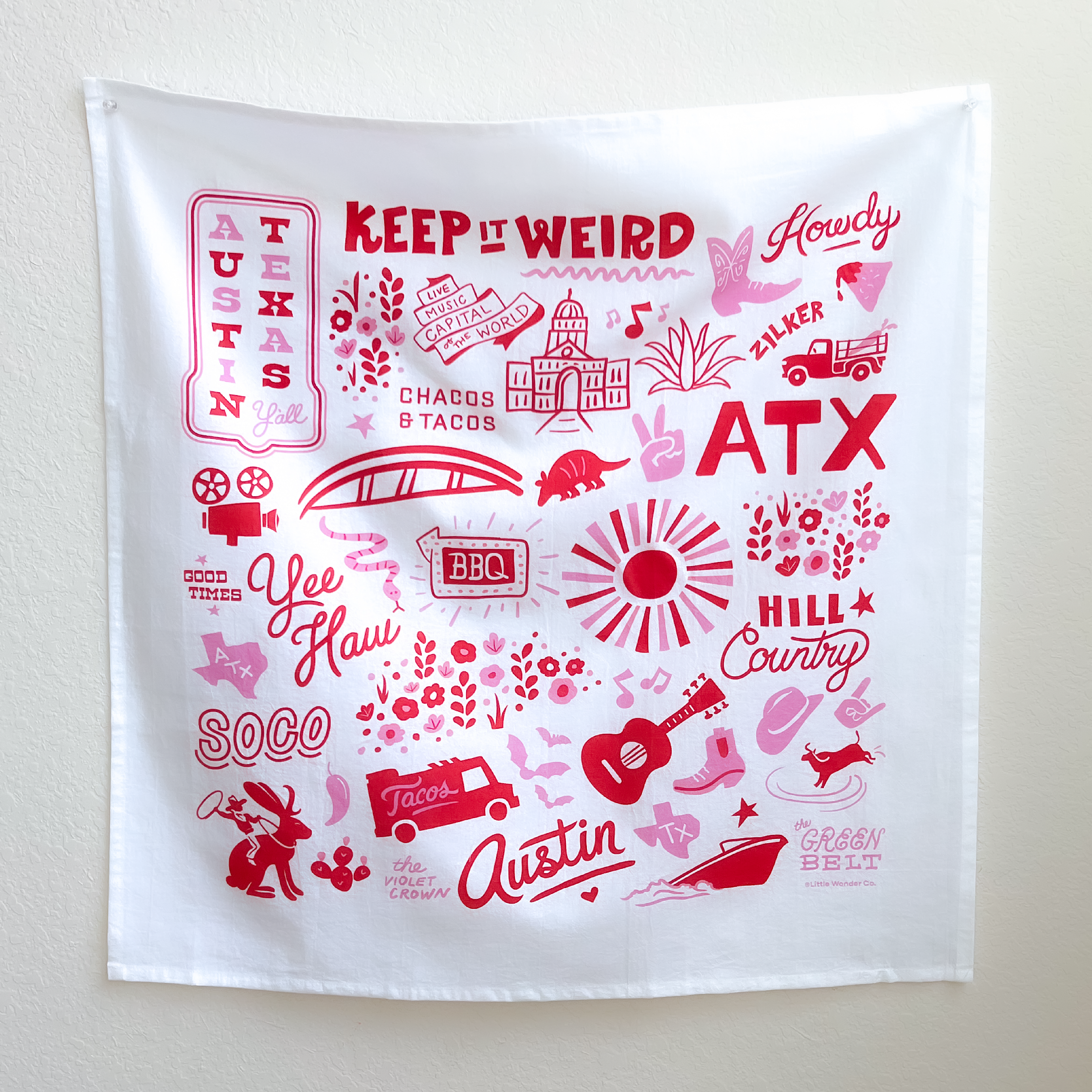 This Austin tea towel is covered in bright, bold, Austin icons. It's a white flour sack tea towel with red and pink art, all created by Austin Illustrator, Annie Mayfield. Makes a great, uniquely Austin gift or souvenir!