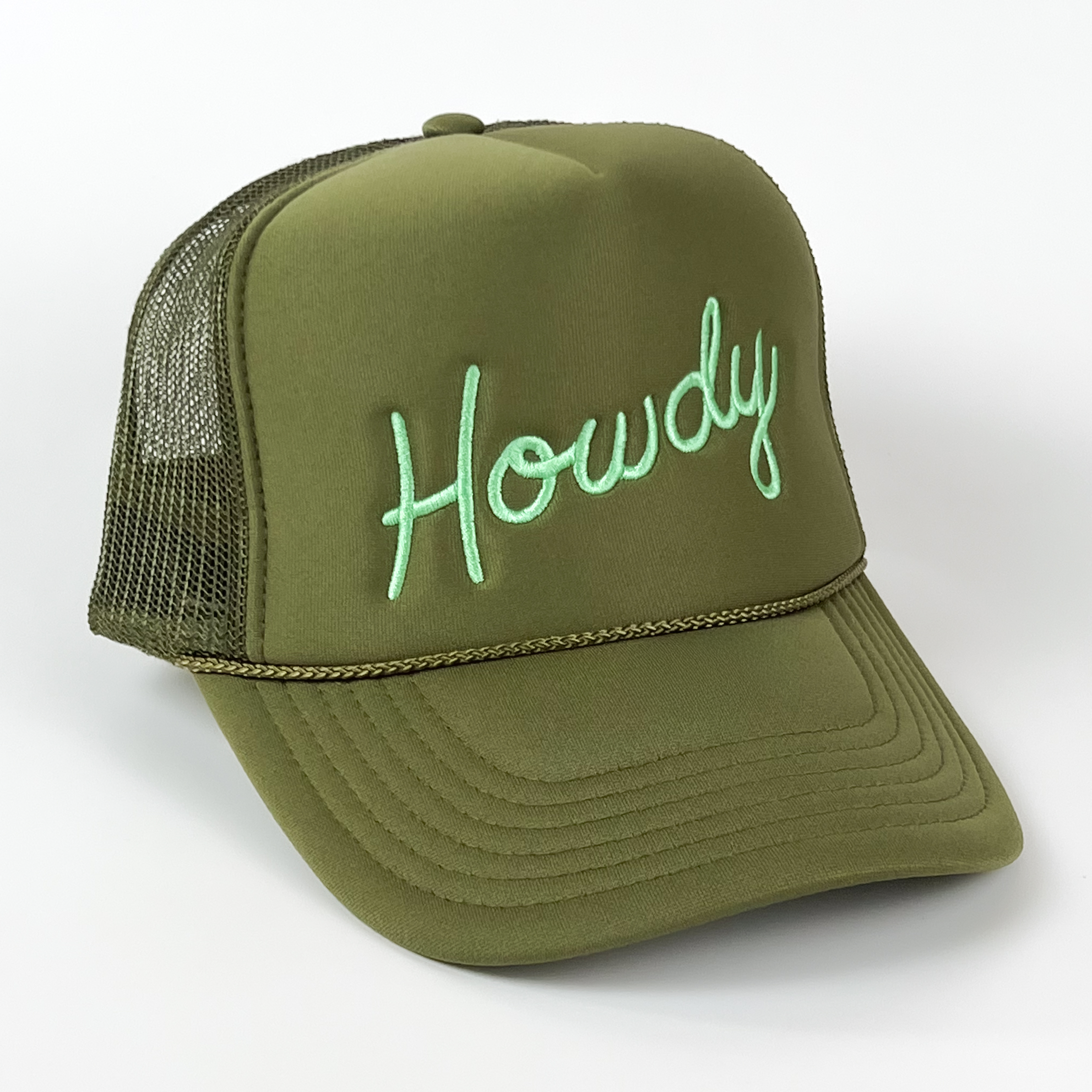 This embroidered 'Howdy' cap is a versatile favorite, with its unique olive green and mint color combination. It was uniquely hand-lettered, and has a touch of western twang!