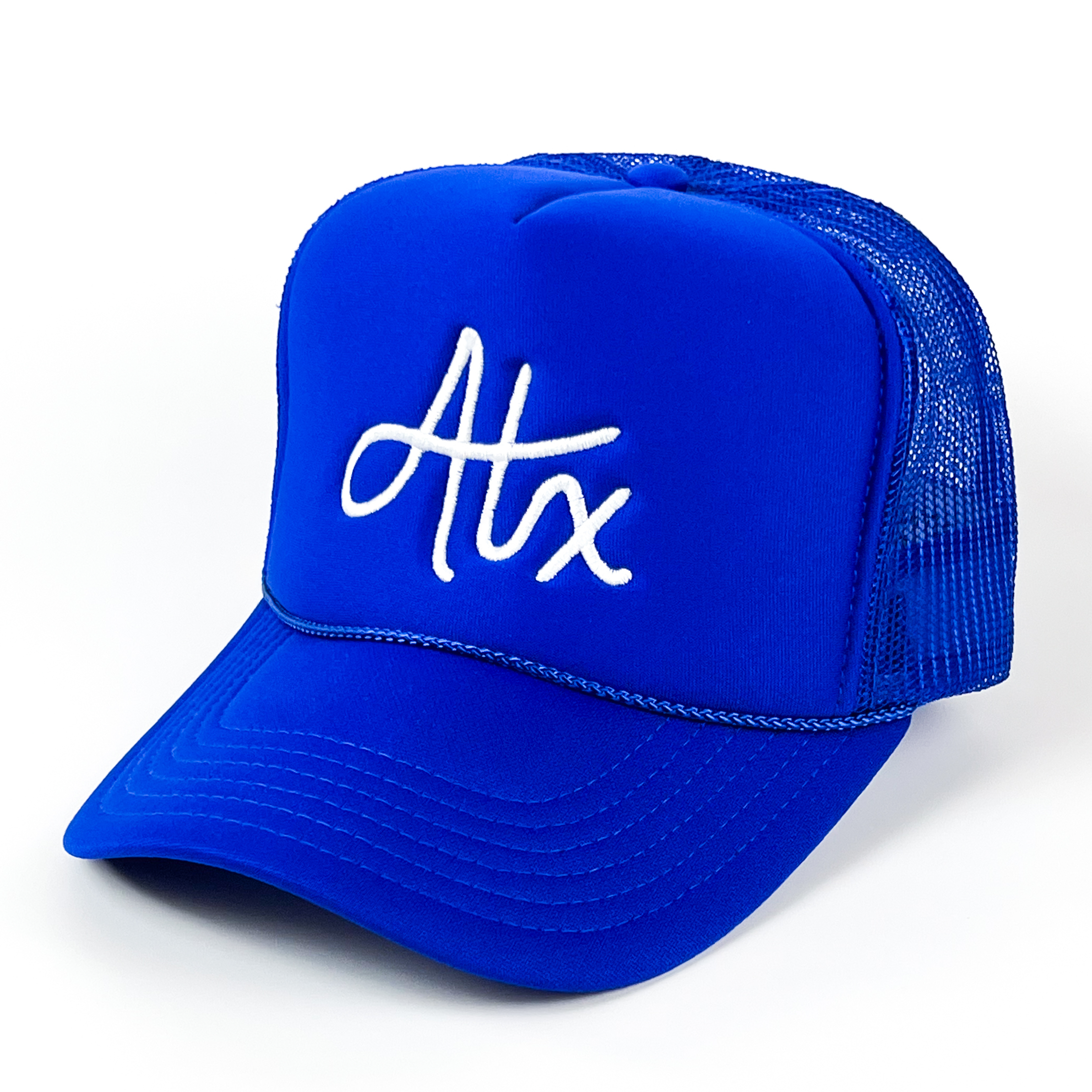 This Austin trucker cap is royally bold, with ATX embroidered in white, on a royal blue cap.