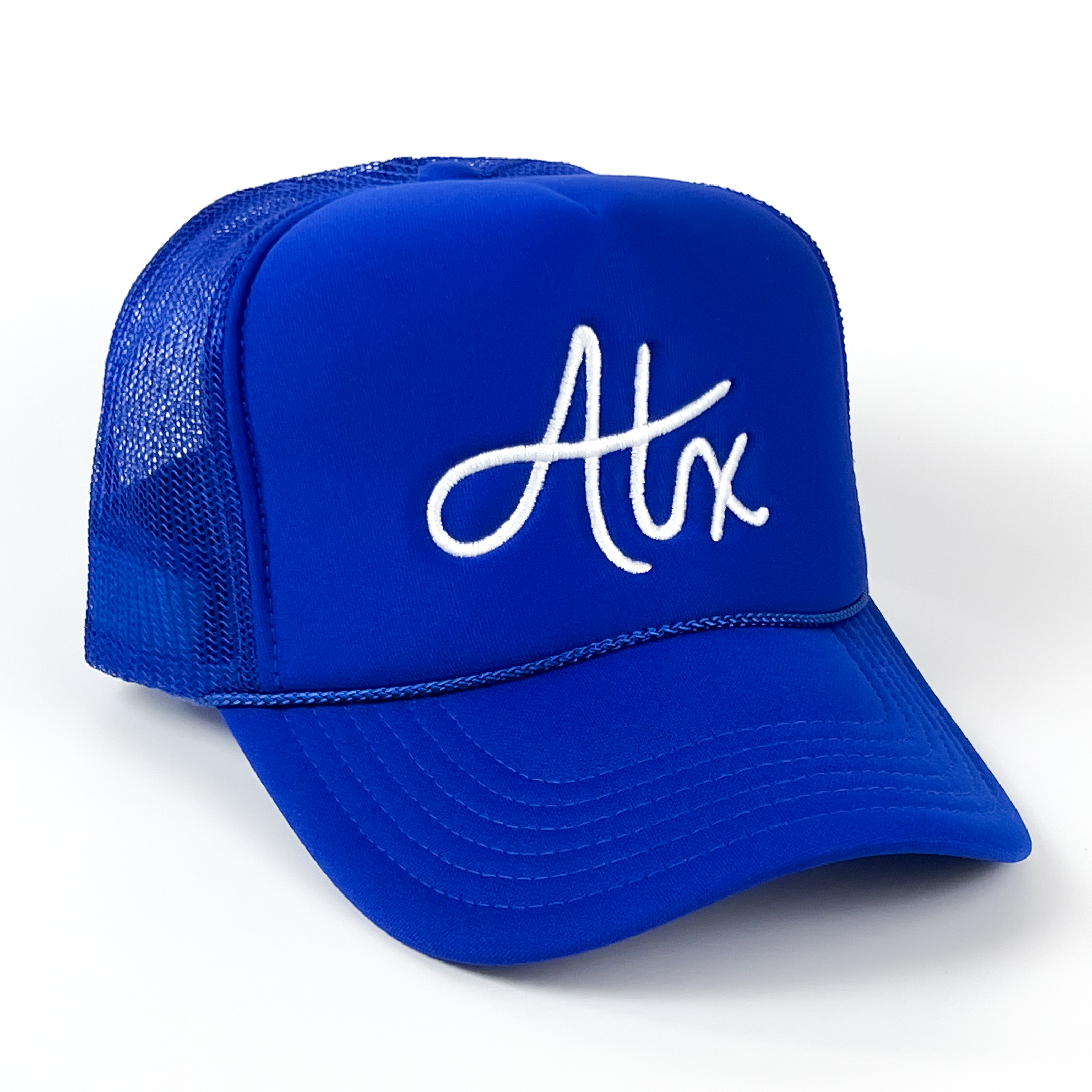 This Austin trucker cap is royally bold, with ATX embroidered in white, on a royal blue cap.